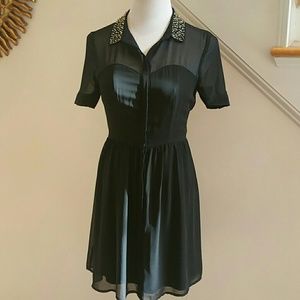 Elegant Black Dress with Embellished Collar